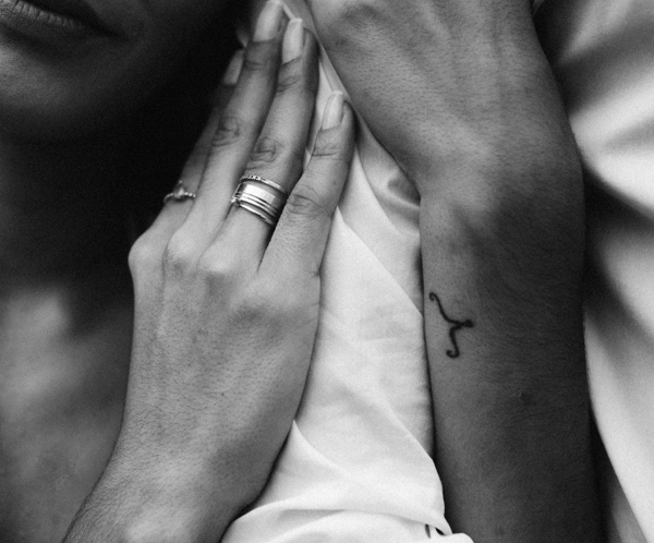 Monochrome Photo Of Woman's Hands With Tattoo