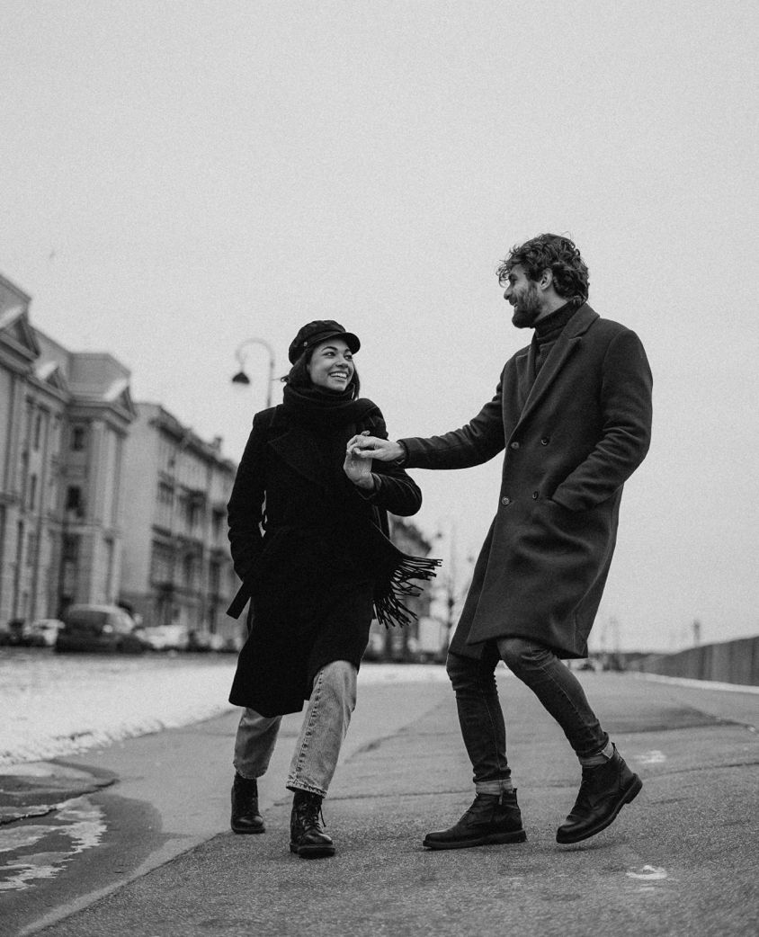 Monochrome Photo Of Couple Walking On Street